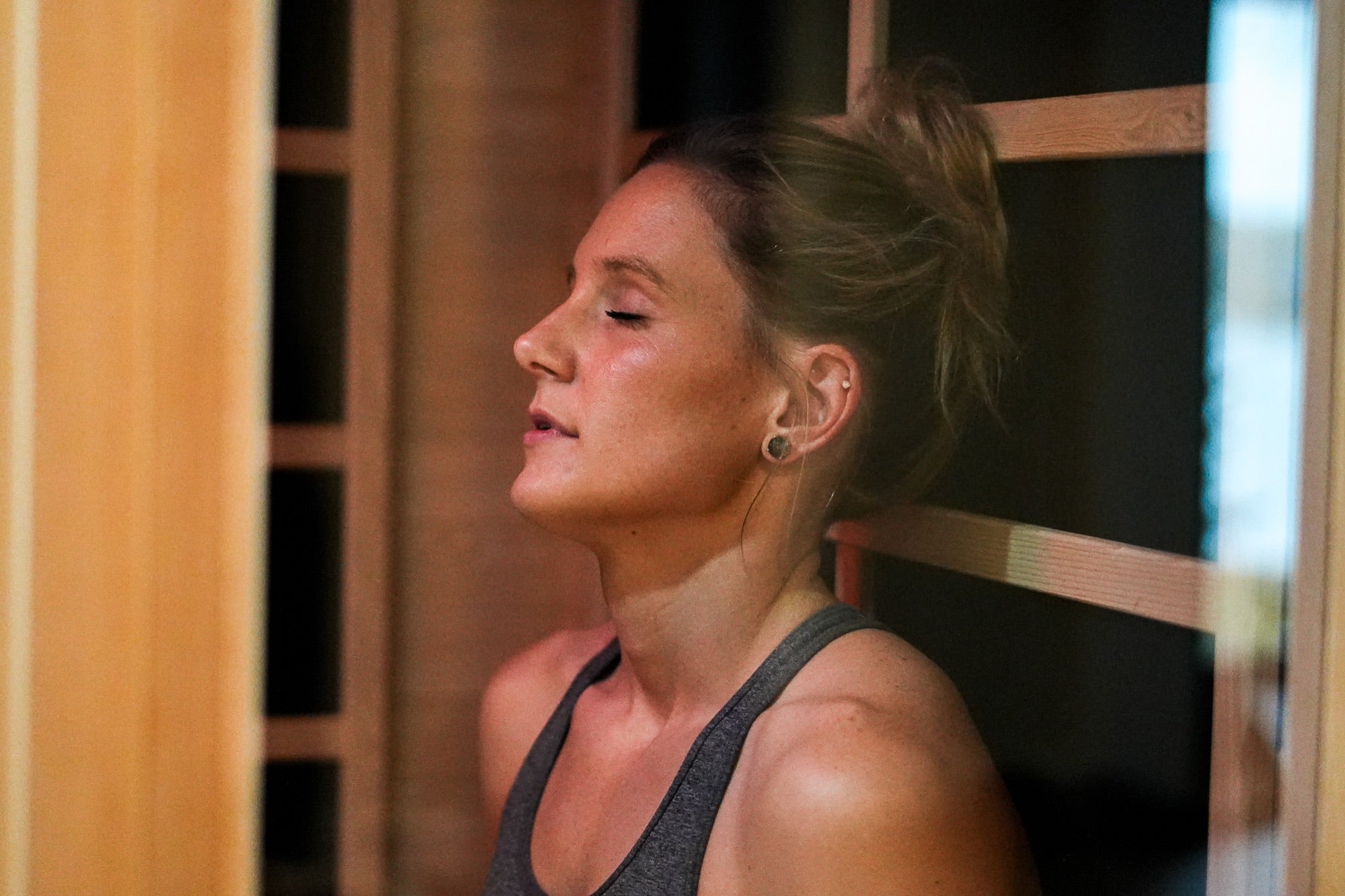 A person relaxing in a HealthSmart infrared sauna